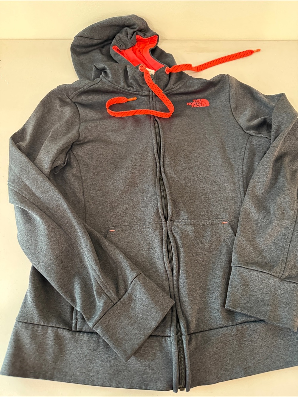 The North Face Kids' Gray Zip Hoodie with Orange Accents